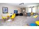 Fun game room with sectional sofa and a dining table at 4577 Target Blvd, Kissimmee, FL 34746