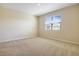 Simple bedroom with neutral walls and carpeted floors at 2204 Mac Blvd, Eagle Lake, FL 33839