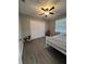 Bedroom with double bed, ceiling fan and large closet at 866 Crows Bluff Ln, Sanford, FL 32773