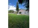 Spacious backyard with grassy area, patio, and trampoline at 866 Crows Bluff Ln, Sanford, FL 32773