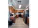 Kitchen with stainless steel appliances and wood cabinets at 866 Crows Bluff Ln, Sanford, FL 32773