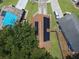 Aerial view of house with solar panels at 2912 Willow Oak Ct, Kissimmee, FL 34744