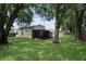 Spacious backyard with lush lawn and shed at 2912 Willow Oak Ct, Kissimmee, FL 34744