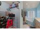 Bathroom with a bathtub, shower, and walk-in closet at 2912 Willow Oak Ct, Kissimmee, FL 34744