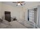 Spacious bedroom with a dresser, bed, and large closet at 2912 Willow Oak Ct, Kissimmee, FL 34744