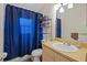 Clean bathroom with shower, toilet, and vanity at 2912 Willow Oak Ct, Kissimmee, FL 34744