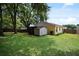 Spacious backyard with shed and wooden fence at 2912 Willow Oak Ct, Kissimmee, FL 34744
