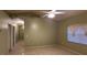 Spacious bedroom with tiled floors and ceiling fan at 2912 Willow Oak Ct, Kissimmee, FL 34744