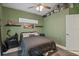 Cozy bedroom with a double bed and ample closet space at 2912 Willow Oak Ct, Kissimmee, FL 34744