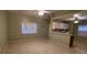 Open living room and kitchen with tiled floors and ceiling fans at 2912 Willow Oak Ct, Kissimmee, FL 34744