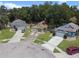 Three houses in a cul-de-sac with solar panels at 2912 Willow Oak Ct, Kissimmee, FL 34744
