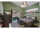 Main bedroom with sliding glass doors leading to the backyard at 2912 Willow Oak Ct, Kissimmee, FL 34744