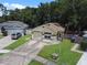 Aerial view of a house, showcasing its location and yard at 2912 Willow Oak Ct, Kissimmee, FL 34744