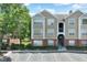Two-story tan building with brick and parking in front at 13103 Mulberry Park Dr # 8211, Orlando, FL 32821