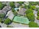 Aerial view of tennis court within residential community at 13103 Mulberry Park Dr # 8211, Orlando, FL 32821