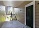 Condo building entry with stairs and private access at 13103 Mulberry Park Dr # 8211, Orlando, FL 32821