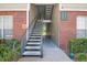 Clean and well-lit condo building stairwell at 13103 Mulberry Park Dr # 8211, Orlando, FL 32821