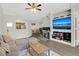 Open concept living room with kitchen and dining area views at 13103 Mulberry Park Dr # 8211, Orlando, FL 32821