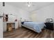 Cozy bedroom with a double bed and a vanity area at 5014 Laguna Bay Cir # 108, Kissimmee, FL 34746