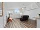 Open living room with high ceilings and lots of natural light at 5014 Laguna Bay Cir # 108, Kissimmee, FL 34746