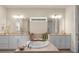 Elegant bathroom featuring double sinks and a free-standing tub at 7650 Wandering Way, Orlando, FL 32836