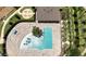 Inviting community pool with ample lounge chairs and a playful water feature at 7650 Wandering Way, Orlando, FL 32836