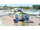 Community playground with swings and climbing structures at 7650 Wandering Way, Orlando, FL 32836