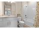 Bright bathroom with a tub, shower, and vanity at 7650 Wandering Way, Orlando, FL 32836