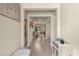 Bright and spacious entryway with tile flooring and a mirror at 7650 Wandering Way, Orlando, FL 32836