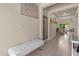 Bright and spacious entryway with tile flooring and a mirror at 7650 Wandering Way, Orlando, FL 32836