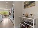 Kitchen bar with wine glasses and liquor storage at 7650 Wandering Way, Orlando, FL 32836