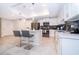 Modern kitchen with stainless steel appliances and an island at 3131 Paradox Cir # 108, Kissimmee, FL 34746