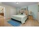 Spacious bedroom with king-size bed and ensuite bathroom at 4825 Clock Tower Dr, Kissimmee, FL 34746