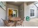 Enjoy dining alfresco on this covered patio at 4825 Clock Tower Dr, Kissimmee, FL 34746