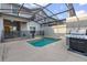 Private screened pool and patio with grill, creating an outdoor oasis at 4825 Clock Tower Dr, Kissimmee, FL 34746