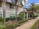 Well maintained townhouse with tropical landscaping at 4825 Clock Tower Dr, Kissimmee, FL 34746