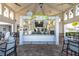 Community bar with seating for residents at 4825 Clock Tower Dr, Kissimmee, FL 34746