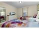 Twin bedroom with Frozen bedding and a full-length mirror at 4825 Clock Tower Dr, Kissimmee, FL 34746