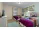 Twin bedroom with Frozen bedding and a TV at 4825 Clock Tower Dr, Kissimmee, FL 34746