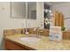 Bathroom with granite countertop and double vanity at 4825 Clock Tower Dr, Kissimmee, FL 34746