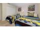 Twin bedroom with Minion bedding and a large closet at 4825 Clock Tower Dr, Kissimmee, FL 34746