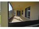 Relaxing screened porch with access to the backyard at 2221 The Oaks Blvd, Kissimmee, FL 34746