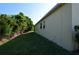 Exterior view of the house and backyard at 2221 The Oaks Blvd, Kissimmee, FL 34746