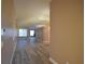Bright and airy living room with hardwood floors at 2221 The Oaks Blvd, Kissimmee, FL 34746