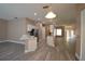 Modern kitchen with an island and breakfast bar at 2221 The Oaks Blvd, Kissimmee, FL 34746