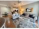 Comfortable living room with light gray sofa and rug at 8826 Dunes Ct # 207, Kissimmee, FL 34747