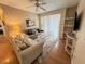 Comfortable living room with hardwood floors and plenty of natural light at 8826 Dunes Ct # 207, Kissimmee, FL 34747