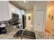 Bright kitchen featuring stainless steel appliances and granite countertops at 8826 Dunes Ct # 207, Kissimmee, FL 34747