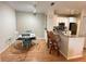 Charming dining area with a table and four chairs at 8826 Dunes Ct # 207, Kissimmee, FL 34747