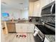 Modern kitchen with stainless steel appliances at 8826 Dunes Ct # 207, Kissimmee, FL 34747